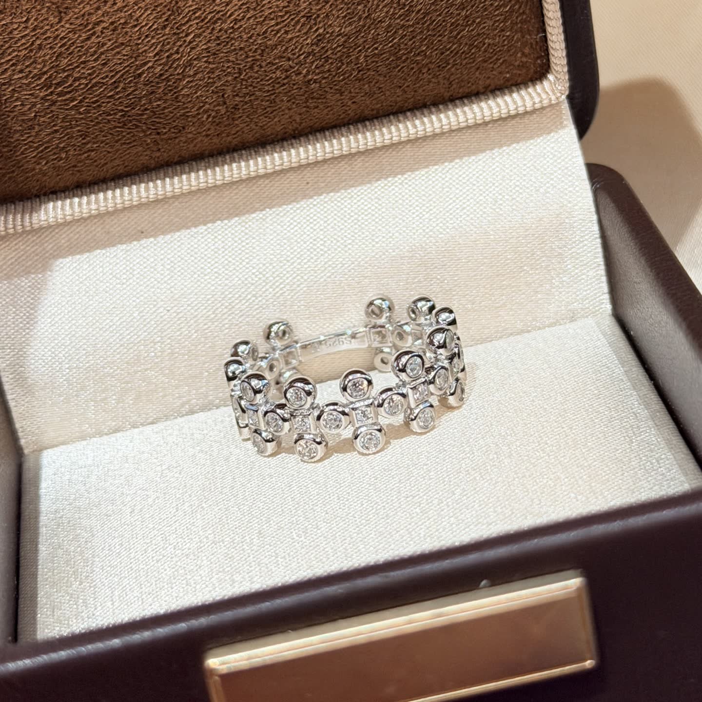 Van Cleef & Arpels Elegant Silver Ring with Cubic Zirconia Stones